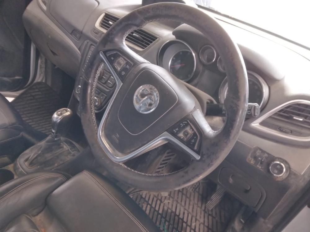 Grimy steering wheel and dashboard before cleaning